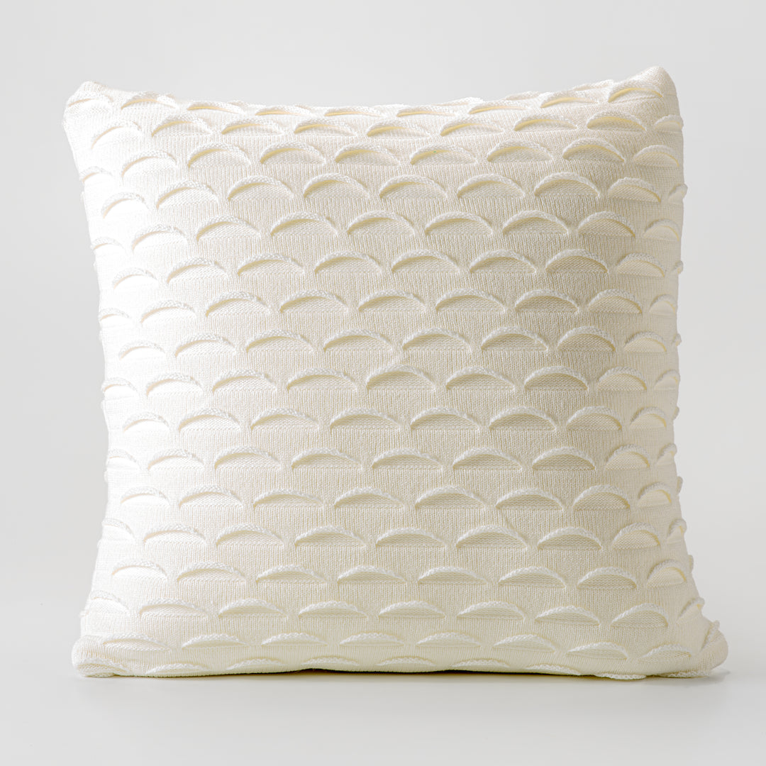 Coussin décoratif en tricot à motif crème