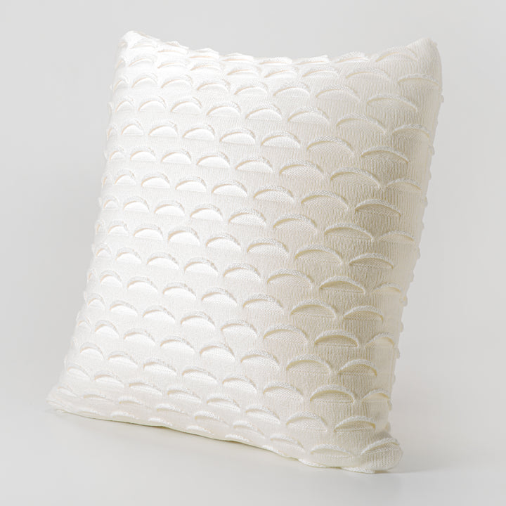 Coussin décoratif en tricot à motif crème