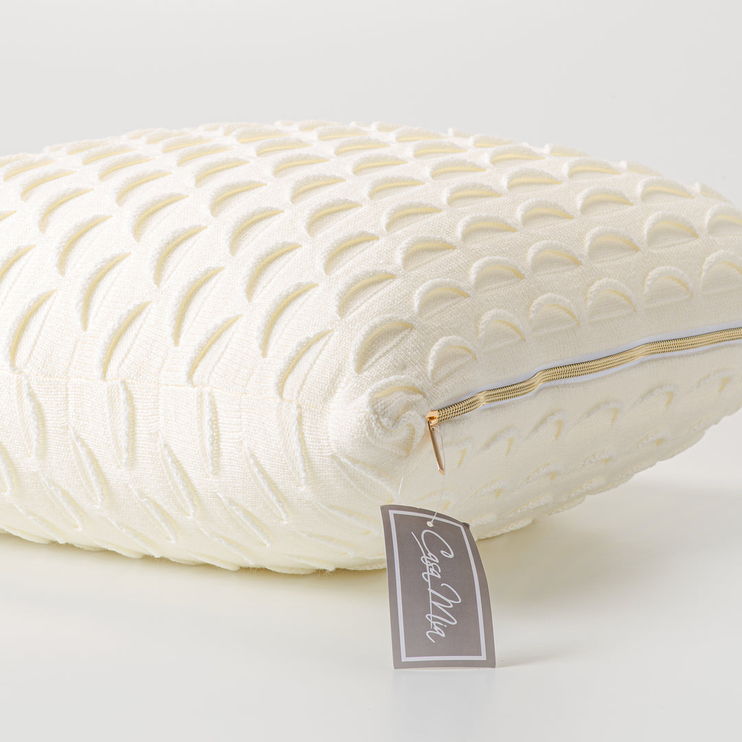 Coussin décoratif en tricot à motif crème