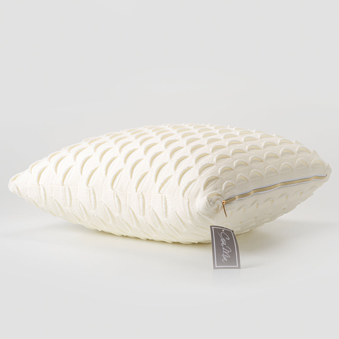 Coussin décoratif en tricot à motif crème