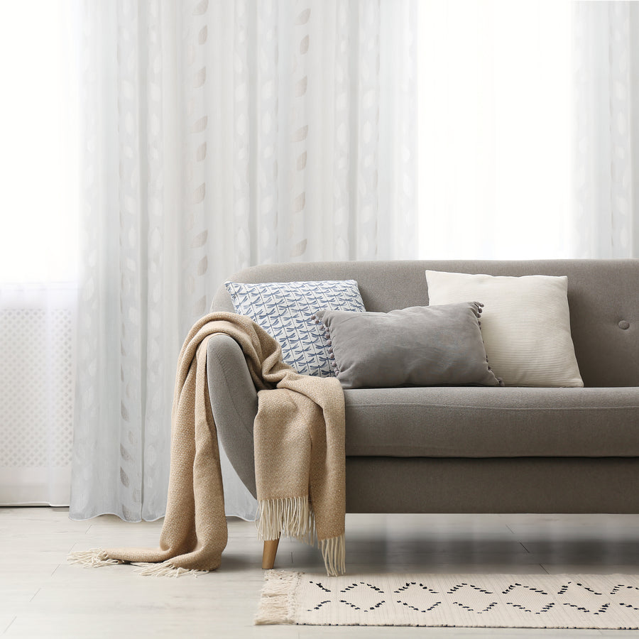 Kali earth leaf jacquard design curtain, styled at a window