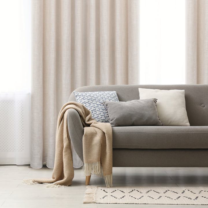 Spezia sheer jacquard design curtain in linen, styled at a window