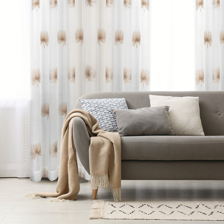 Stella beige embroidered curtain, styled at a window