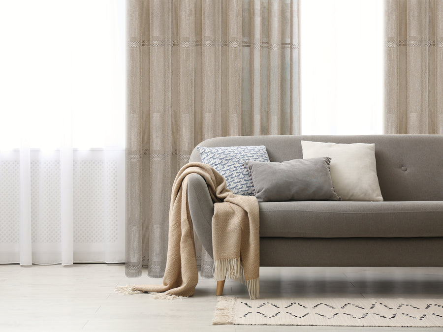 Termoli boho inspired semi sheer jacquard curtain in cafe, styled at a window