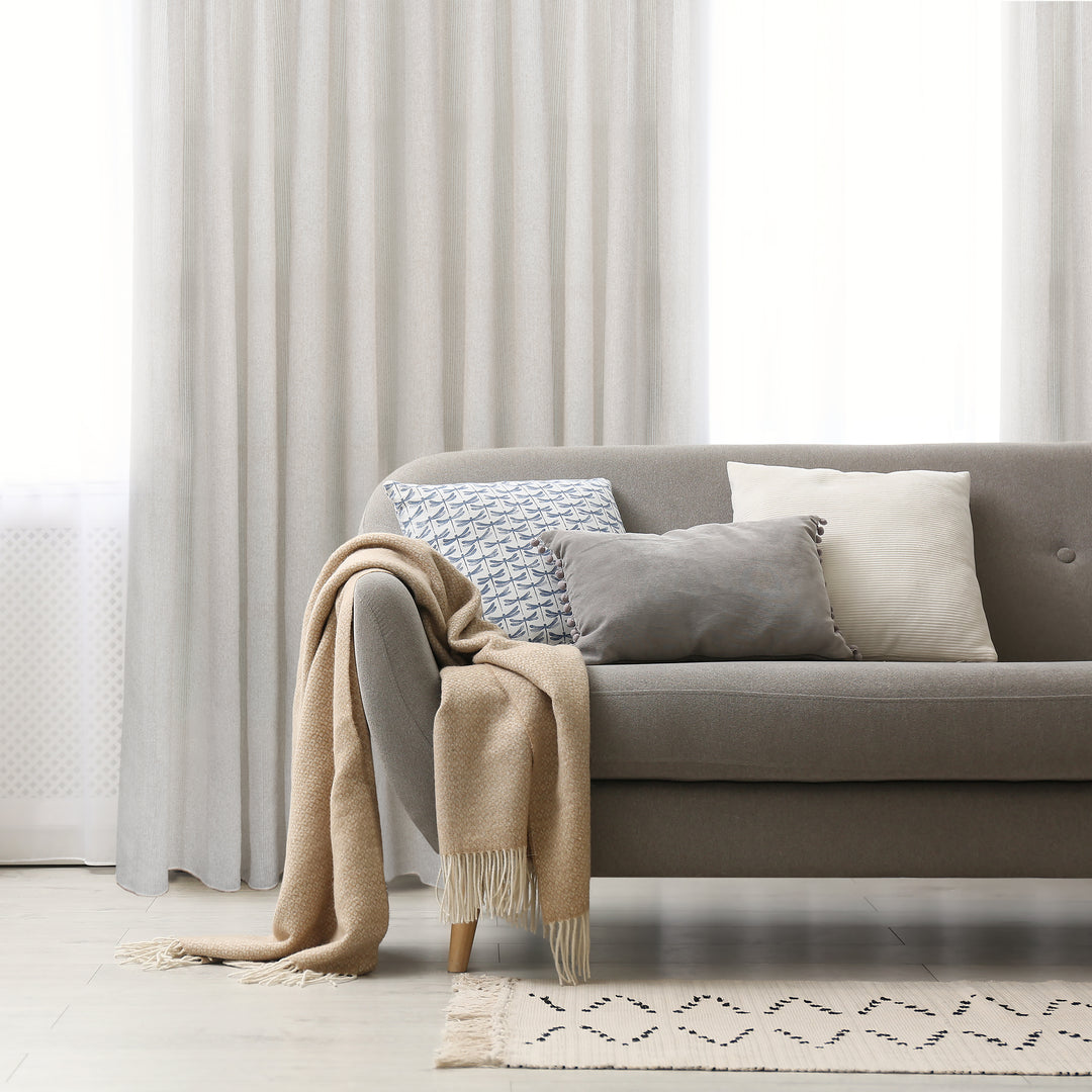 Vigo greige sheer jacquard design curtain, styled at a window
